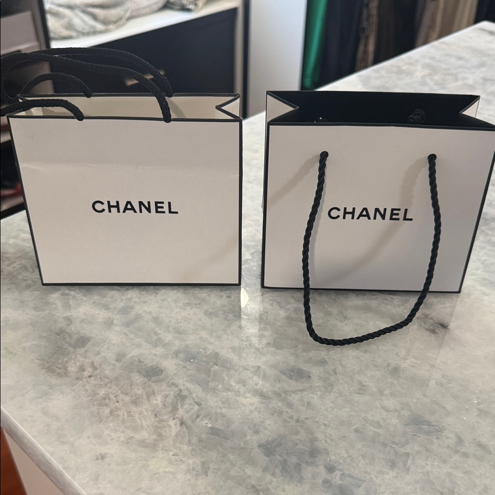 CHANEL White Bags with Black Rope Handles
